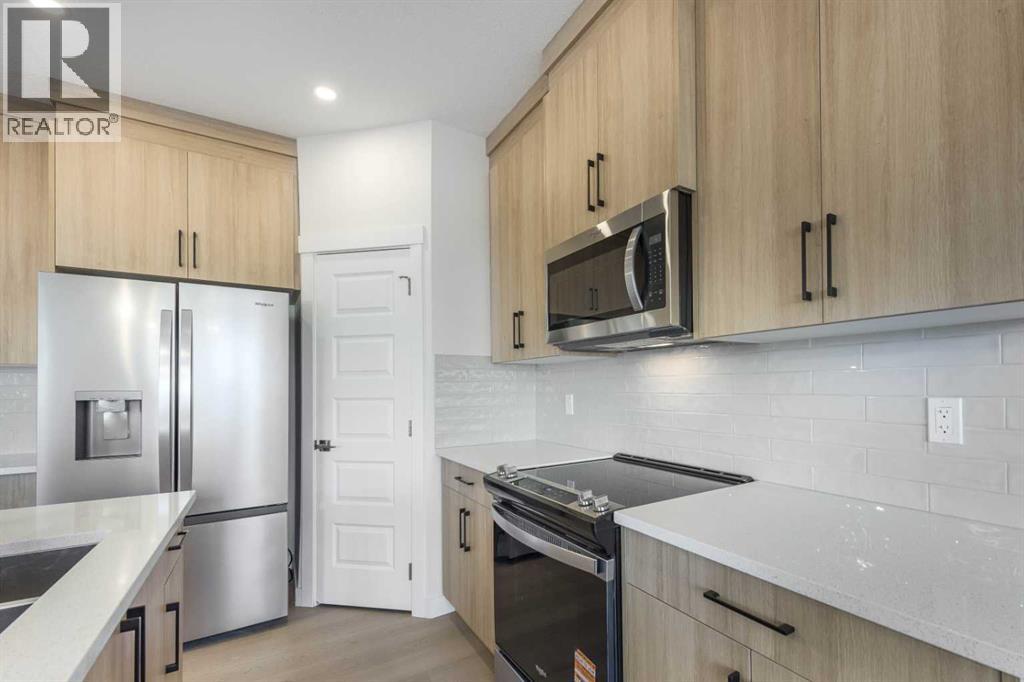 122 Sandpiper Bend, Chestermere, Alberta  T1X 2S8 - Photo 4 - A2292925