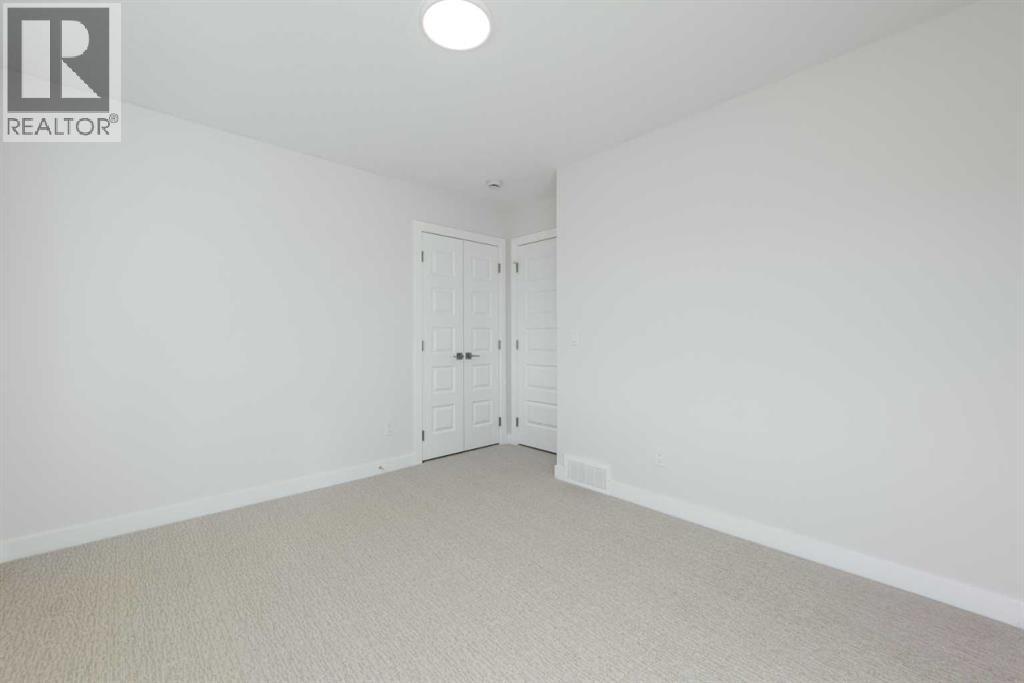 126 Sandpiper Bend, Chestermere, Alberta  T1X 2S8 - Photo 29 - A2292958