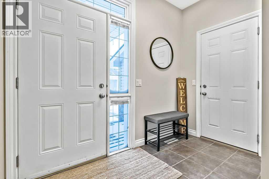 48 Tucker Circle, Okotoks, Alberta  T1S 2J7 - Photo 2 - A2287383