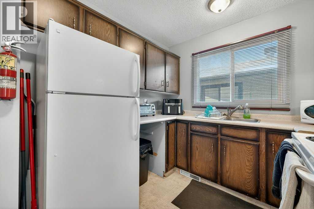 60 Bermuda Court Nw, Calgary, Alberta  T3K 1H3 - Photo 7 - A2292777