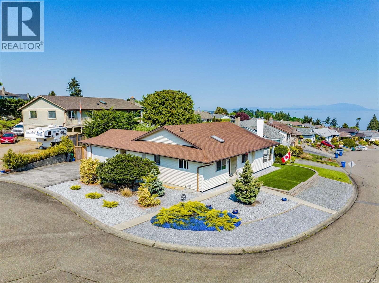 6243 Sechelt Dr, Nanaimo, British Columbia  V9V 1C6 - Photo 1 - 1028371