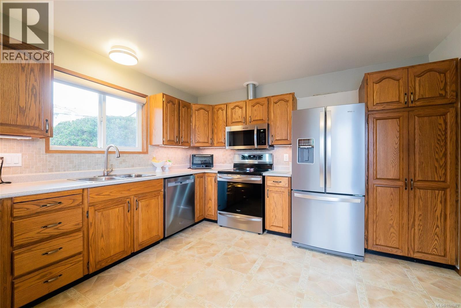 6243 Sechelt Dr, Nanaimo, British Columbia  V9V 1C6 - Photo 3 - 1028371