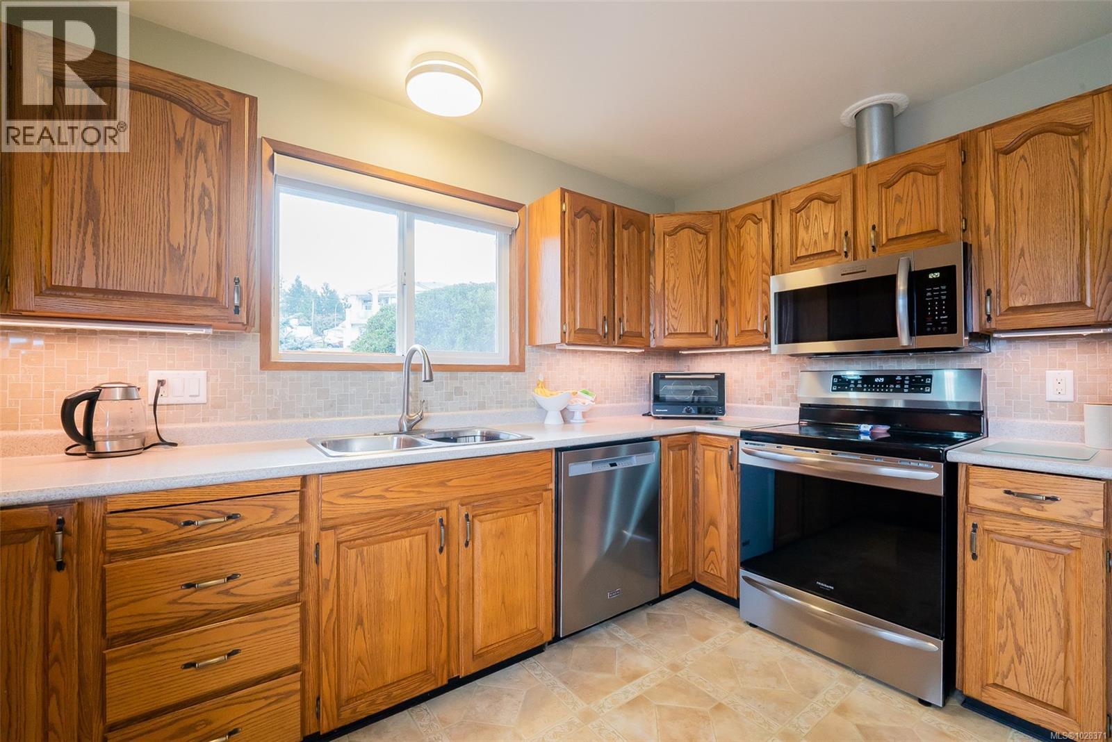 6243 Sechelt Dr, Nanaimo, British Columbia  V9V 1C6 - Photo 4 - 1028371