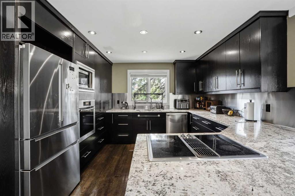 311 Coach Light Bay Sw, Calgary, Alberta  T3H 1X3 - Photo 18 - A2286955