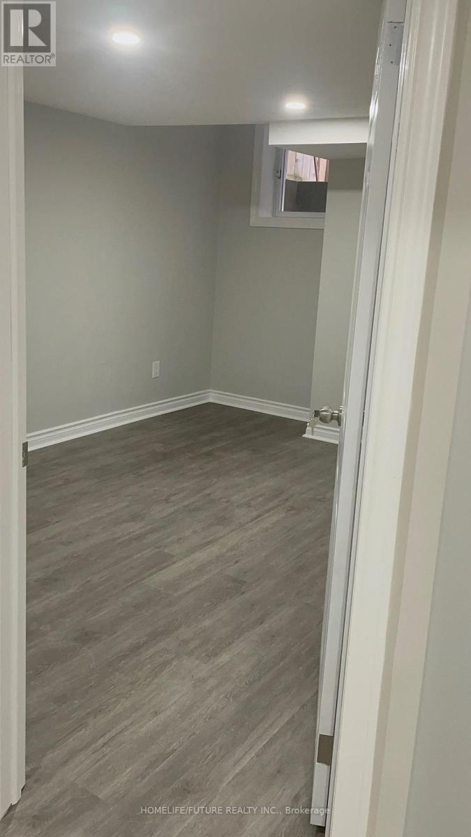 Bsmt - 2 Hoover Park Drive, Whitchurch-Stouffville, Ontario  L4A 1S1 - Photo 7 - N12877010