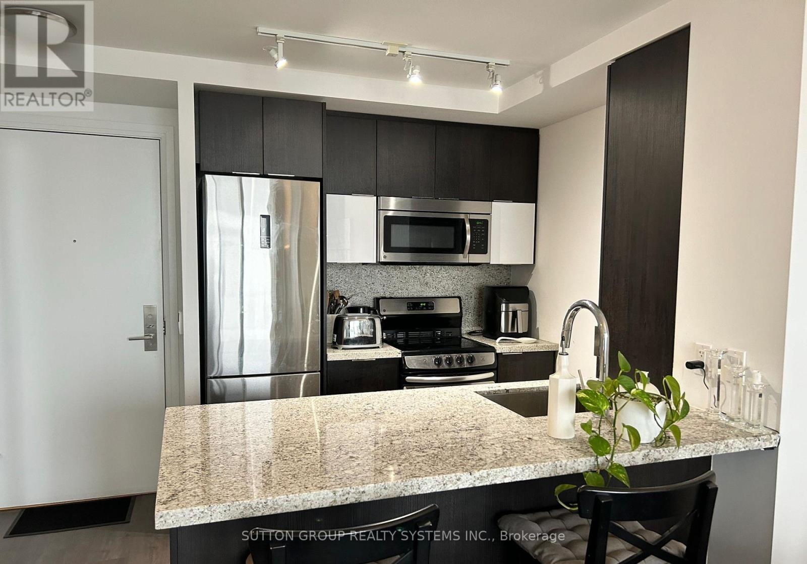 56 Annie Craig Drive, Toronto, Ontario  M8V 0C5 - Photo 3 - W12877274