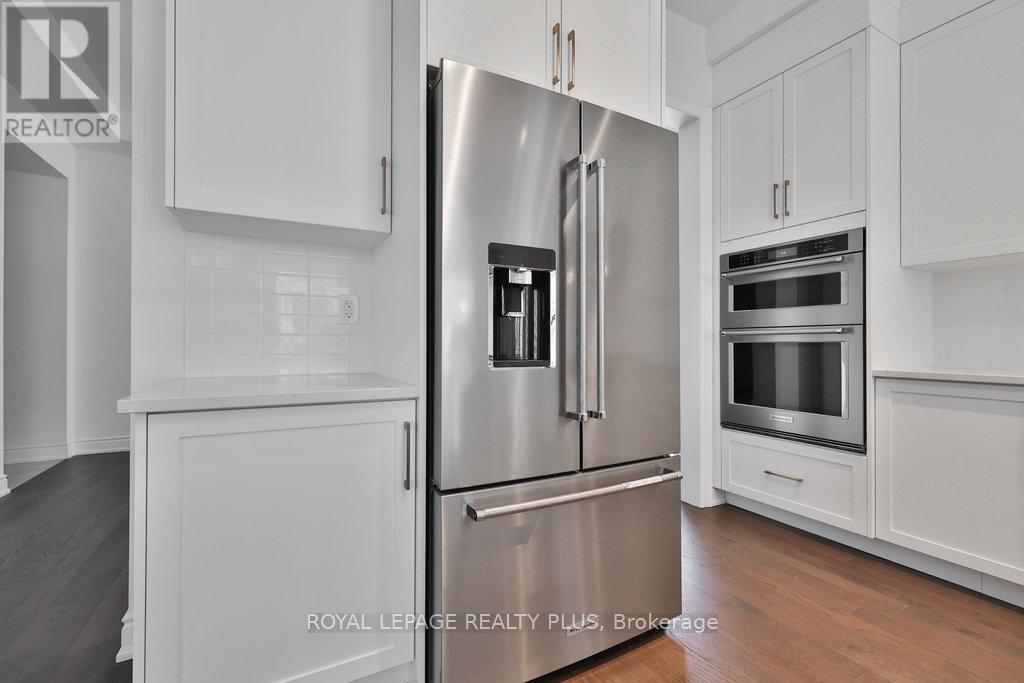 1327 Wheat Boom Drive, Oakville, Ontario  L6H 7Z6 - Photo 6 - W12877812