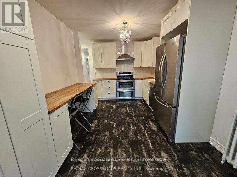 -Main - 33 Branstone Road, Toronto, Ontario  M6E 4E3 - Photo 8 - W12878024