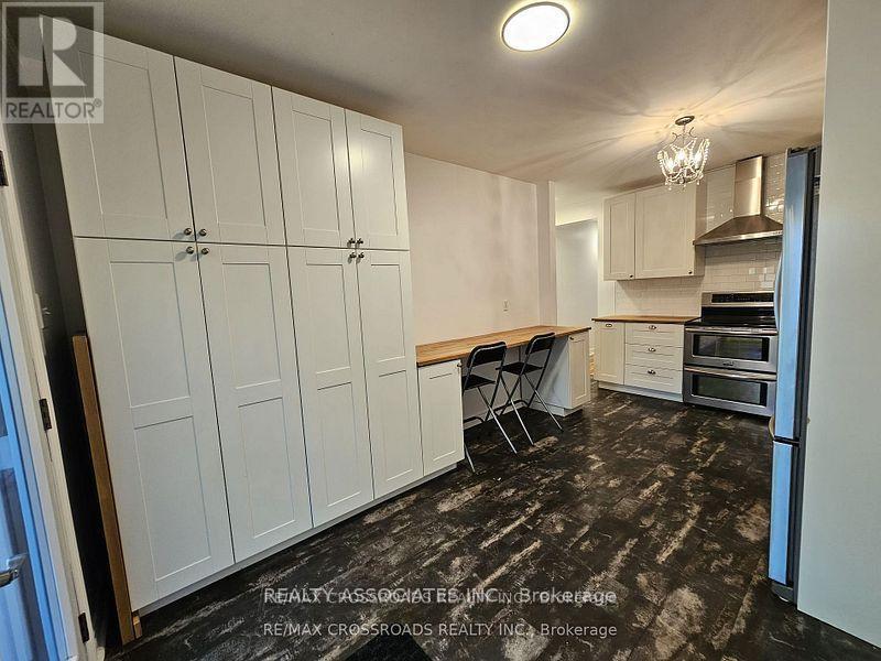 -Main - 33 Branstone Road, Toronto, Ontario  M6E 4E3 - Photo 9 - W12878024