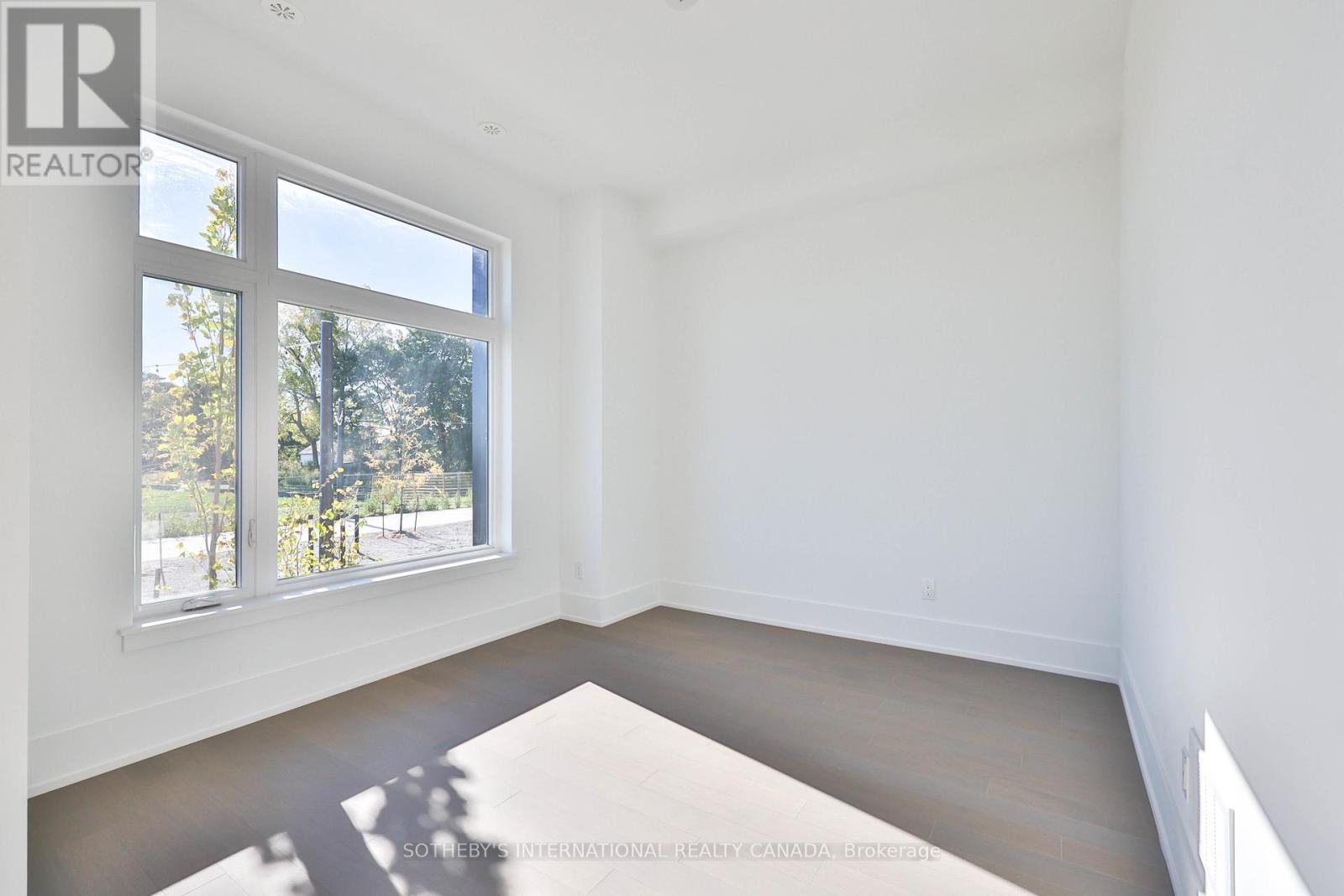 Th 85 - 60 Lou Parsons Way Drive, Mississauga, Ontario  L5H 0B2 - Photo 4 - W12878118