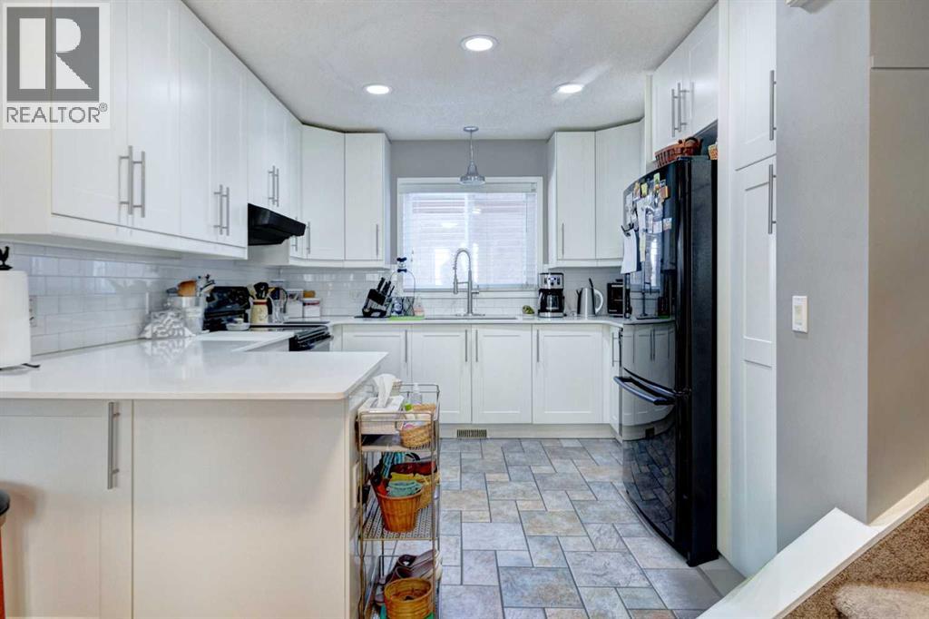 156 Cedarbrook Way Sw, Calgary, Alberta  T2W 4R5 - Photo 8 - A2289817