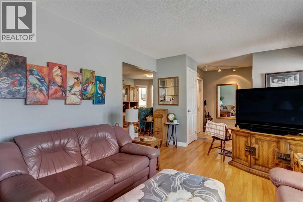 156 Cedarbrook Way Sw, Calgary, Alberta  T2W 4R5 - Photo 6 - A2289817