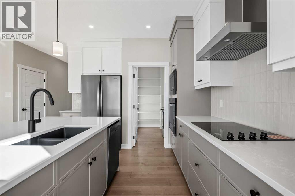 151 Dawson Wharf Mount, Chestermere, Alberta  T1X 2W4 - Photo 11 - A2292338