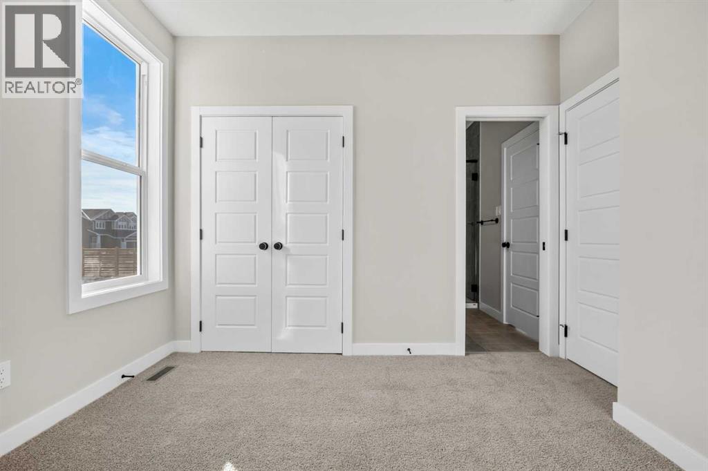 151 Dawson Wharf Mount, Chestermere, Alberta  T1X 2W4 - Photo 25 - A2292338