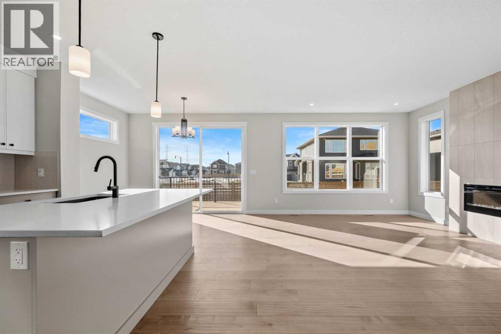 151 Dawson Wharf Mount, Chestermere, Alberta  T1X 2W4 - Photo 3 - A2292338