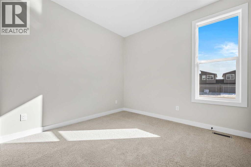 151 Dawson Wharf Mount, Chestermere, Alberta  T1X 2W4 - Photo 24 - A2292338