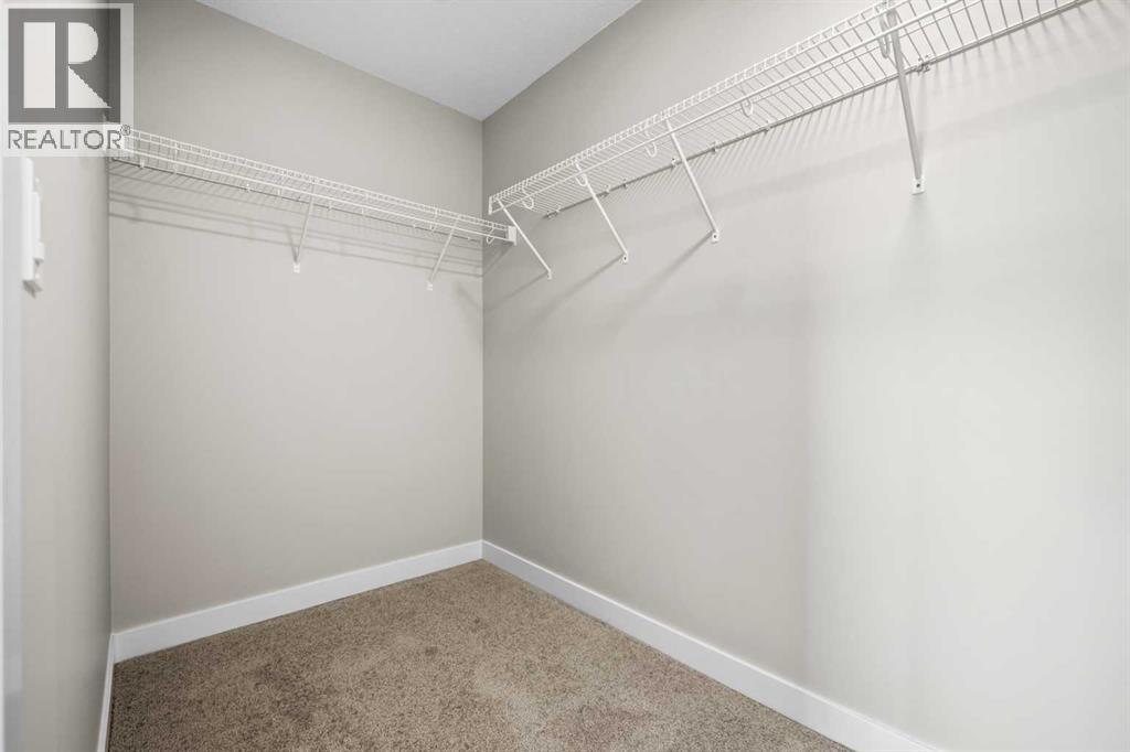 151 Dawson Wharf Mount, Chestermere, Alberta  T1X 2W4 - Photo 36 - A2292338