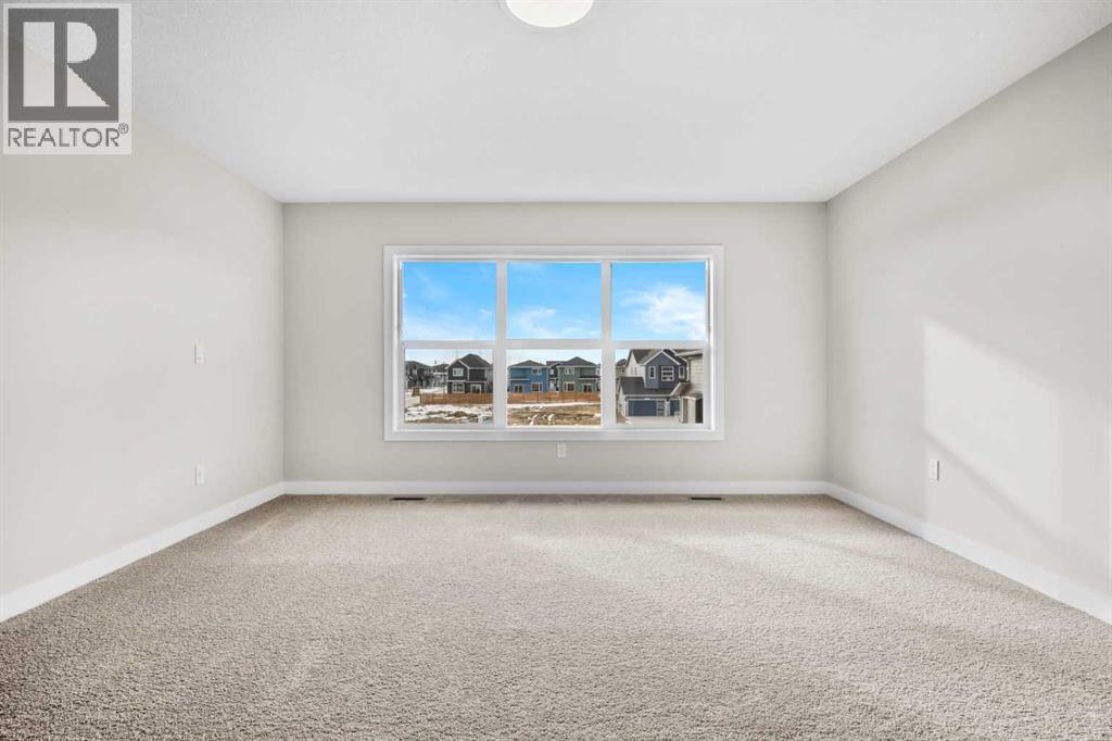 151 Dawson Wharf Mount, Chestermere, Alberta  T1X 2W4 - Photo 34 - A2292338