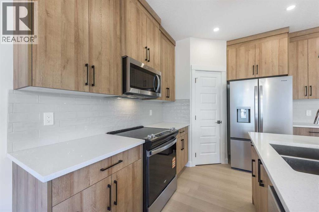 126 Sandpiper Bend, Chestermere, Alberta  T1X 2S8 - Photo 4 - A2292958