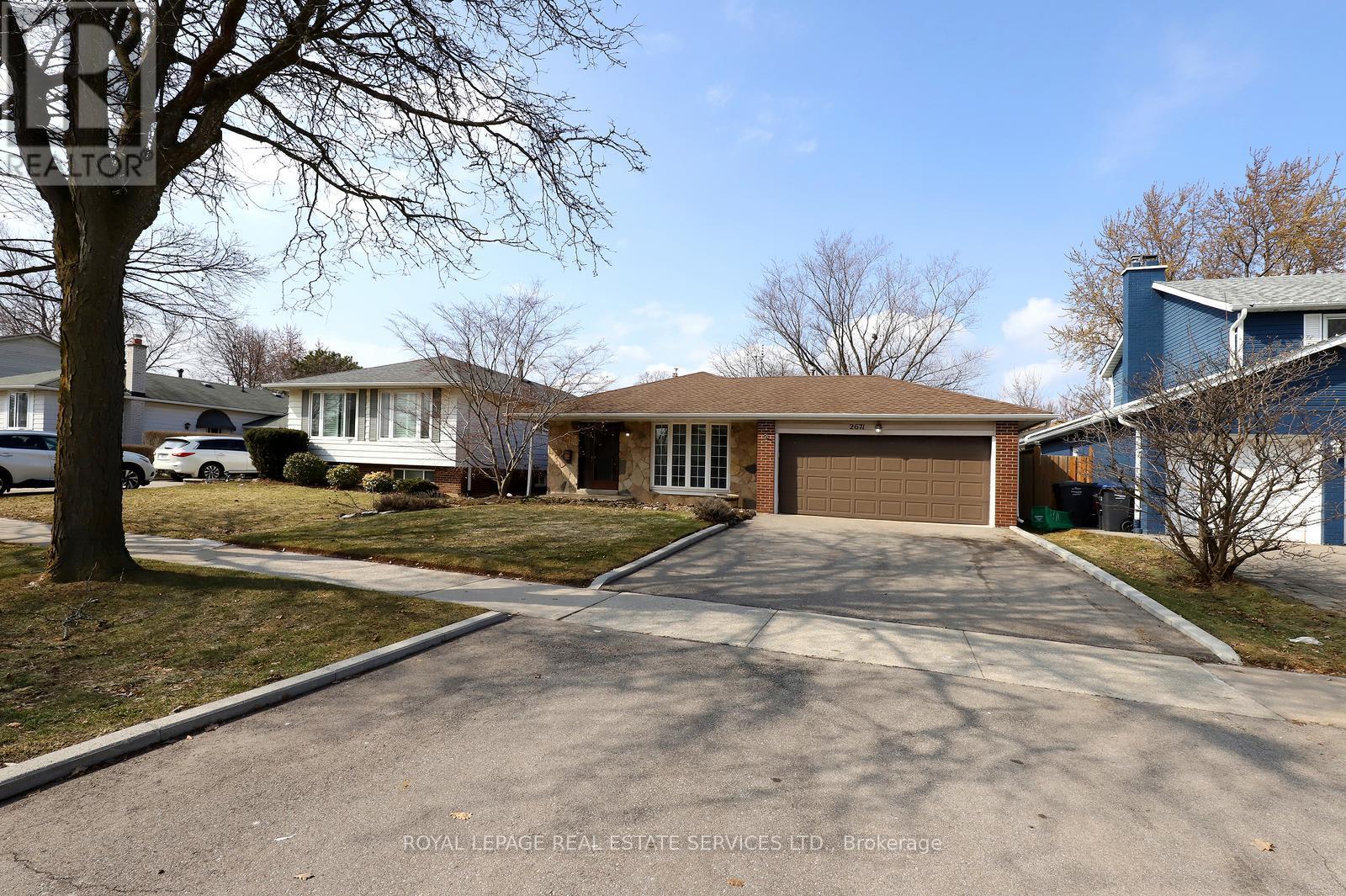 2671 Homelands Drive, Mississauga, Ontario  L5K 1H7 - Photo 2 - W12878528