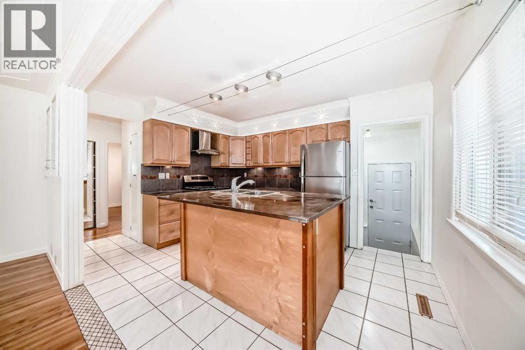 820 9a Street NE, Calgary, Alberta  T2E 4L6 - Photo 9 - A2290177