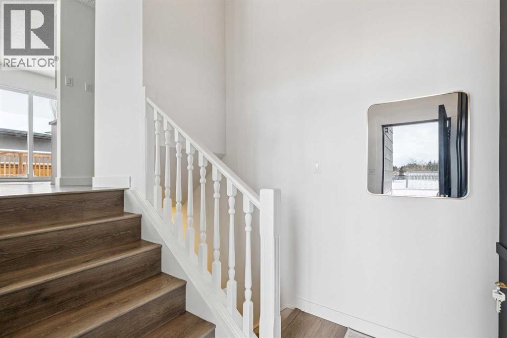 11016 Braton Place Sw, Calgary, Alberta  T2W 1B3 - Photo 7 - A2292154