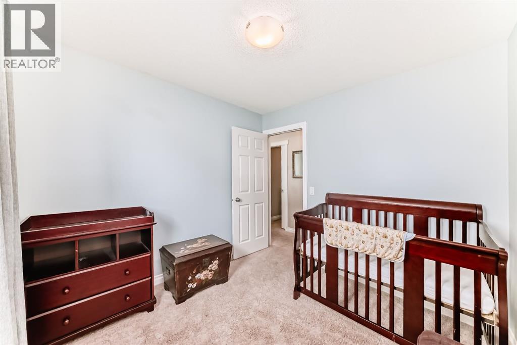 10 Reunion Grove Nw, Airdrie, Alberta  T4B 0Z7 - Photo 23 - A2292885