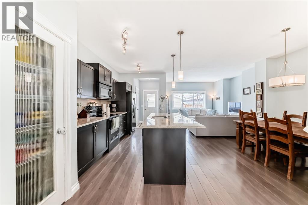 10 Reunion Grove Nw, Airdrie, Alberta  T4B 0Z7 - Photo 4 - A2292885