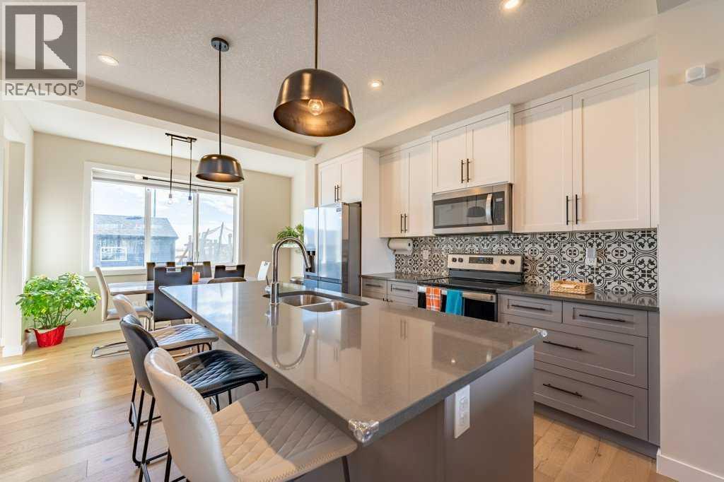 153 Waterford Boulevard, Chestermere, Alberta  T1X 2M9 - Photo 8 - A2293145