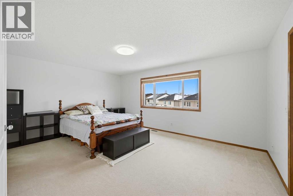 125 Panamount Heath Nw, Calgary, Alberta  T3K 6J9 - Photo 14 - A2291772