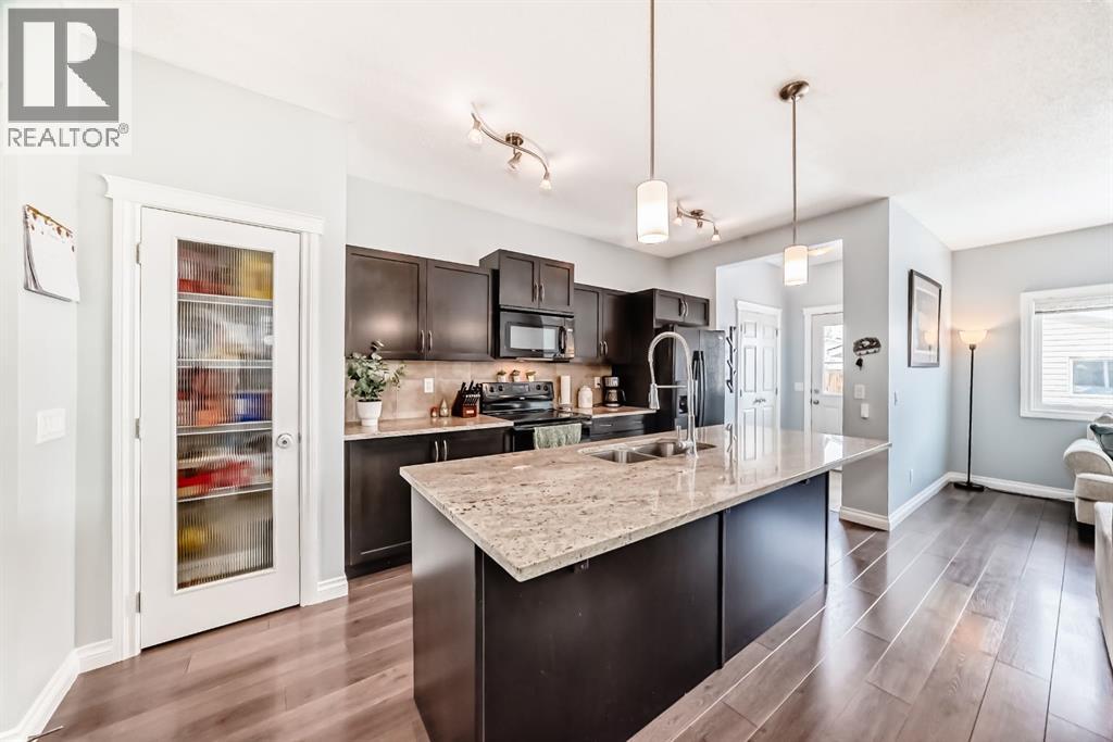 10 Reunion Grove Nw, Airdrie, Alberta  T4B 0Z7 - Photo 3 - A2292885