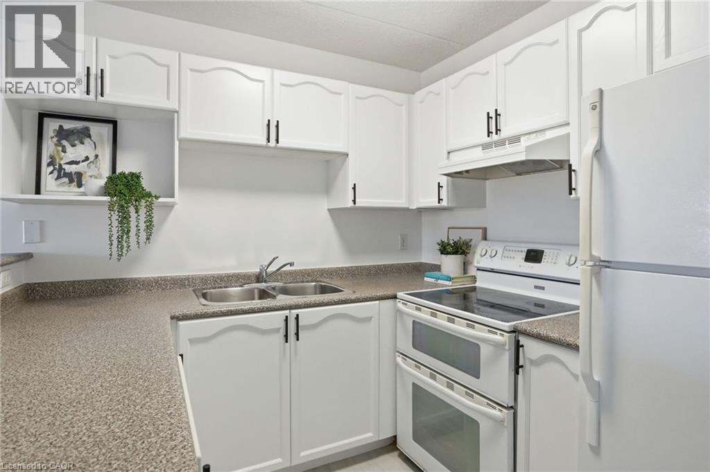 1431 Walkers Line Unit# 309, Burlington, Ontario  L7M 4P3 - Photo 5 - 40807575