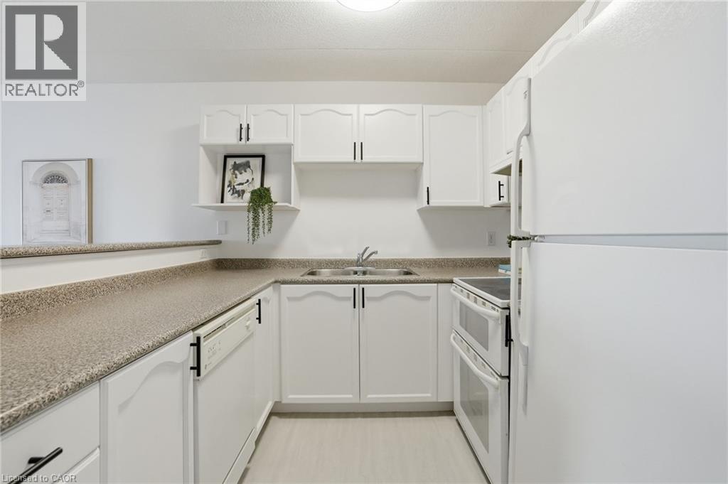 1431 Walkers Line Unit# 309, Burlington, Ontario  L7M 4P3 - Photo 4 - 40807575