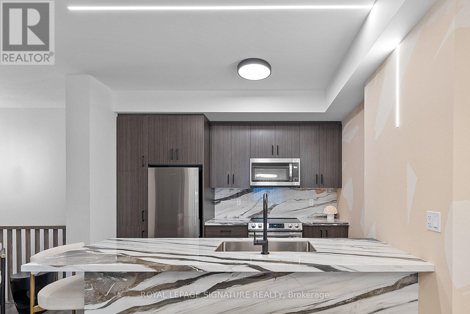 Th114 - 30 William Jackson Way, Toronto, Ontario  M8V 0J7 - Photo 13 - W12879498