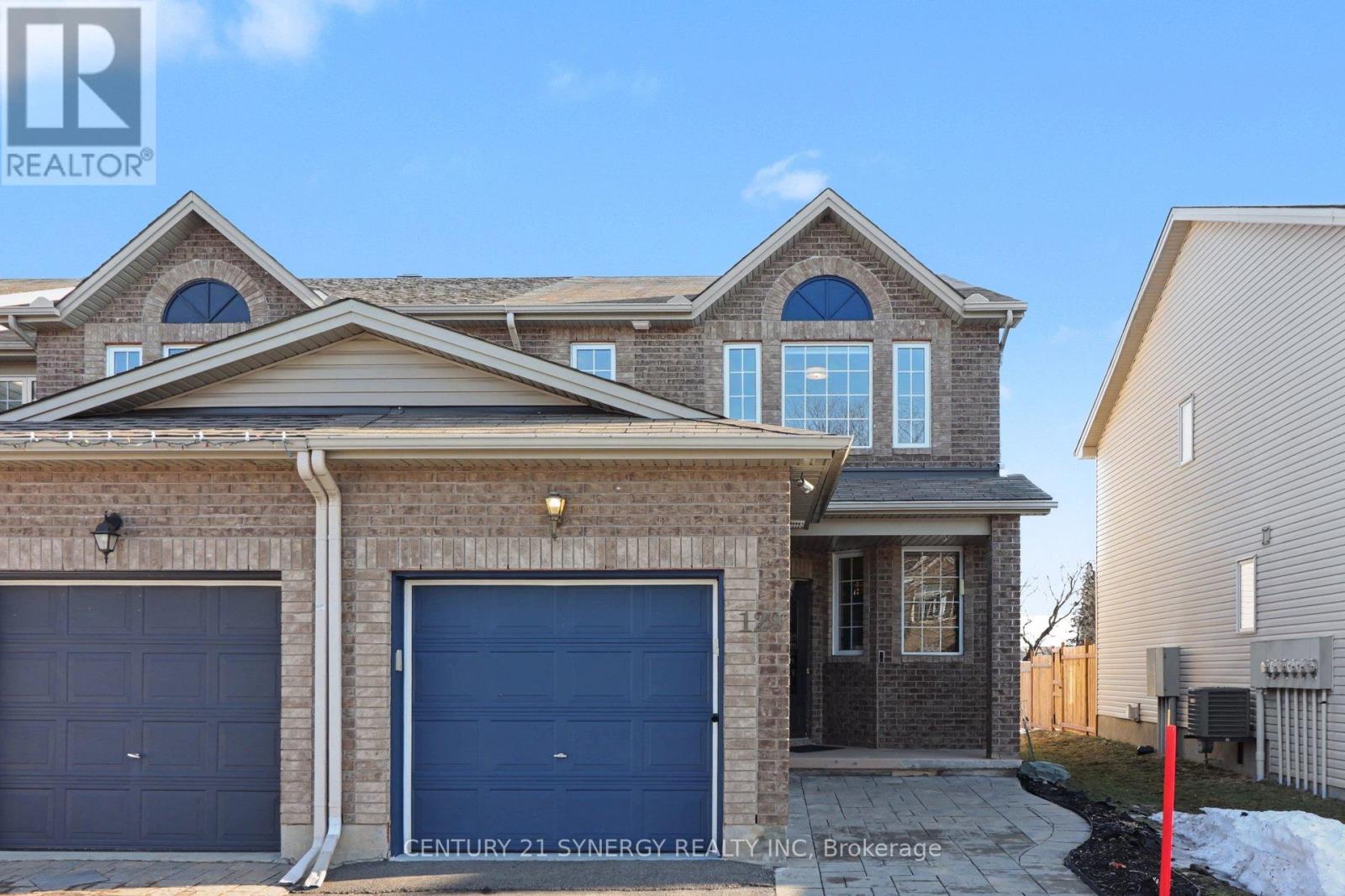 Stunning fully upgraded 3-bedroom end-unit townhome with no rear neighbours in a sought-after Orléans neighbourhood. With over $80,000 in upgrades and renovations, this beautifully maintained home offers a modern, move-in-ready space designed for comfortable everyday living.The bright and functional main floor features durable updated flooring throughout, (home is completely carpet free) along with a convenient main floor office and laundry, perfect for working from home or managing busy family life. The spacious kitchen flows effortlessly into the living and dining areas, creating a warm and inviting space ideal for entertaining.Upstairs you'll find three generous bedrooms, including a beautifully renovated ensuite (2021/2022) and stylish updated flooring (2021/2022) that continues the home's fresh, modern aesthetic.The lower level offers a perfect flex space for a family room, playroom, or home gym, complete with a cozy gas fireplace that makes it an inviting retreat year-round.Step outside to a private backyard with no rear neighbours, ideal for relaxing or hosting summer gatherings. Enjoy the natural gas BBQ hookup and a garden filled with beautiful perennial landscaping that returns year after year.Major updates include furnace (2021), A/C (2021), updated flooring, renovated ensuite, and front bedroom windows replaced by the current owners. (id:48254)