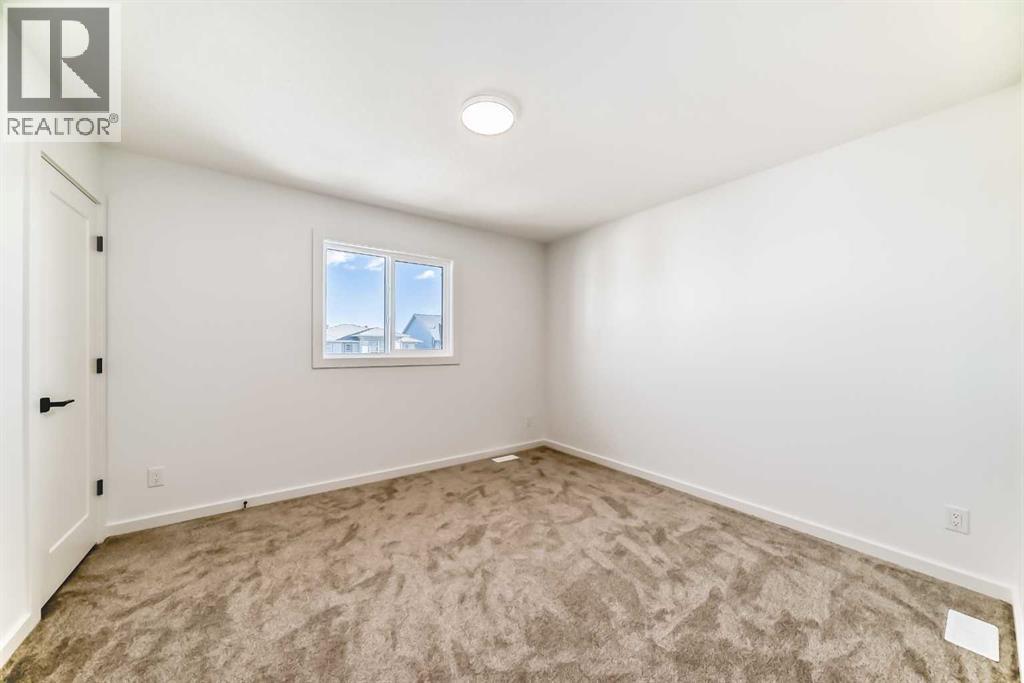 63 Creekside Path Sw, Calgary, Alberta  T2X 5V9 - Photo 24 - A2279480