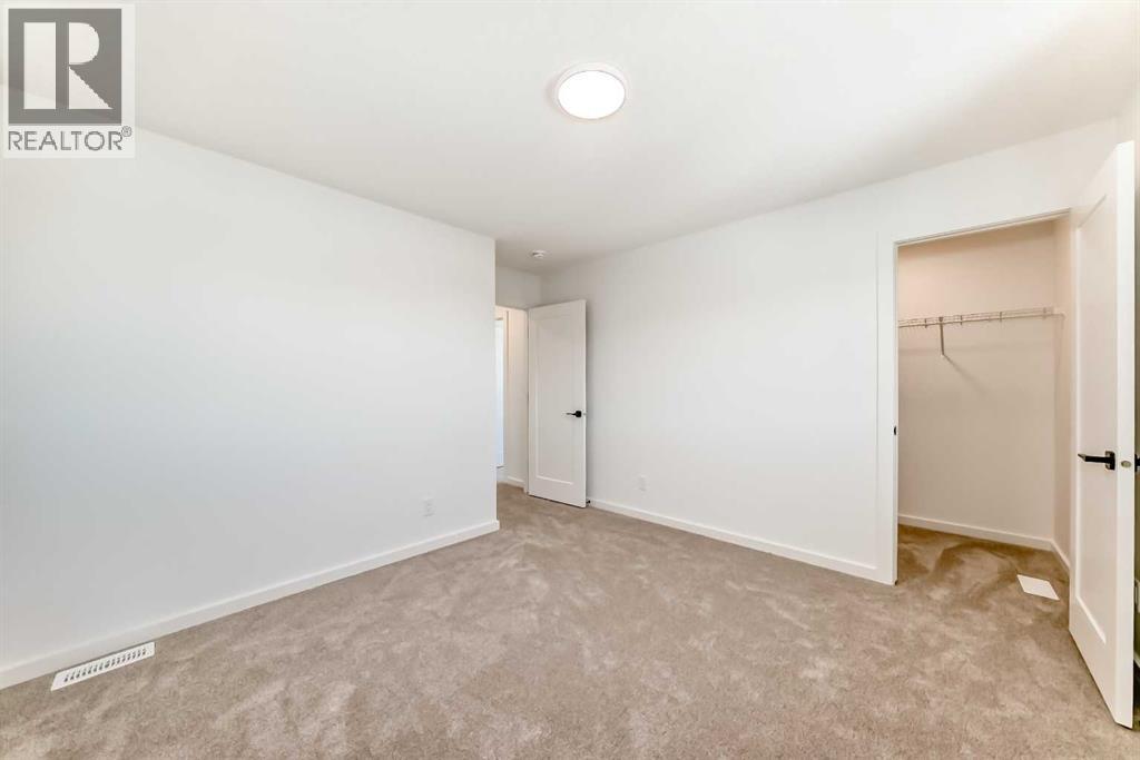 63 Creekside Path Sw, Calgary, Alberta  T2X 5V9 - Photo 25 - A2279480