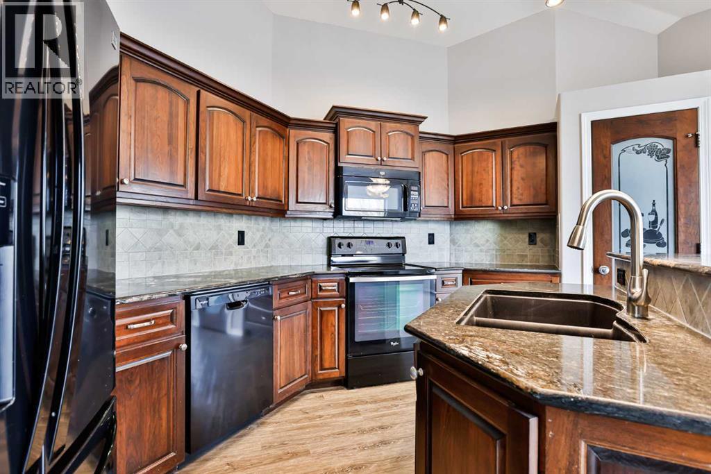 147 Heritage Circle W, Lethbridge, Alberta  T1K 7K5 - Photo 3 - A2290740