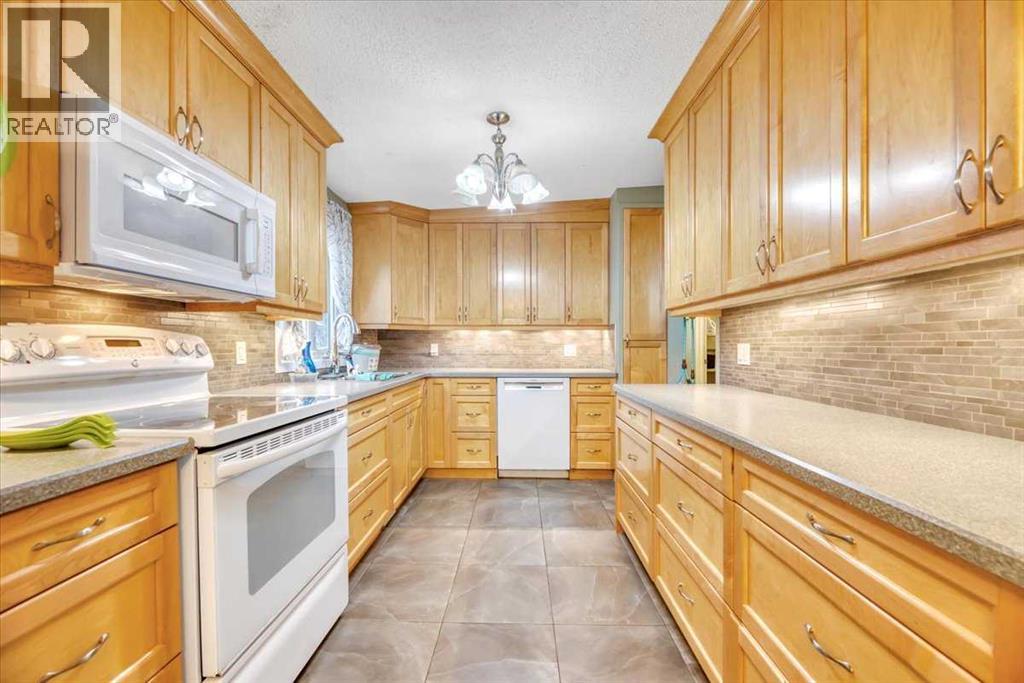 712 Kingsmere Crescent Sw, Calgary, Alberta  T2V 2H7 - Photo 4 - A2291999