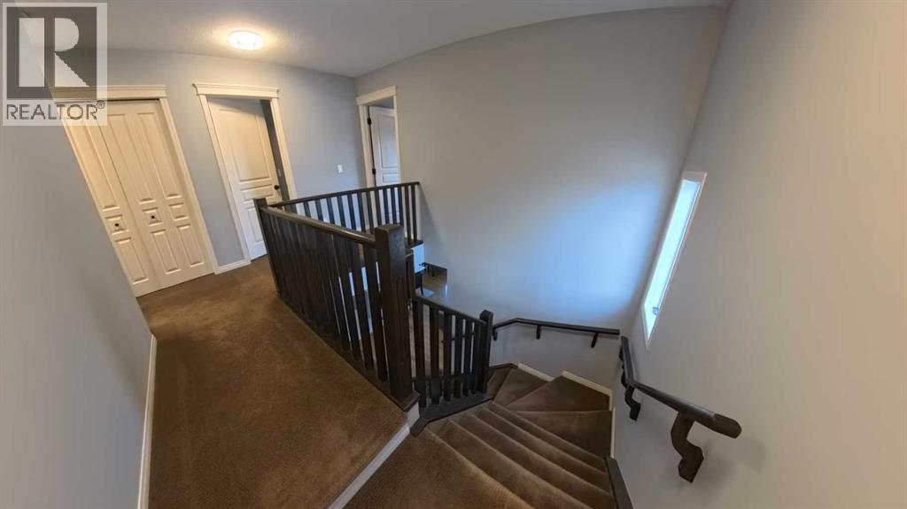 466 Cimarron Boulevard, Okotoks, Alberta  T1S 0H7 - Photo 6 - A2292029