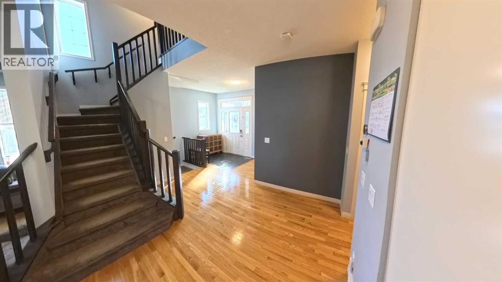 466 Cimarron Boulevard, Okotoks, Alberta  T1S 0H7 - Photo 2 - A2292029