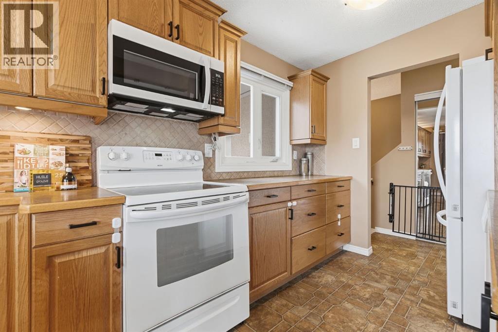 6605 Huntridge Hill Ne, Calgary, Alberta  T2K 4A1 - Photo 7 - A2292144