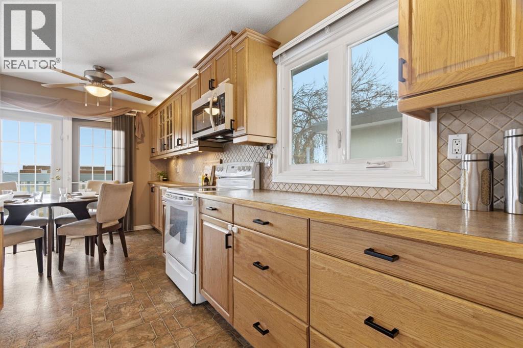 6605 Huntridge Hill Ne, Calgary, Alberta  T2K 4A1 - Photo 6 - A2292144