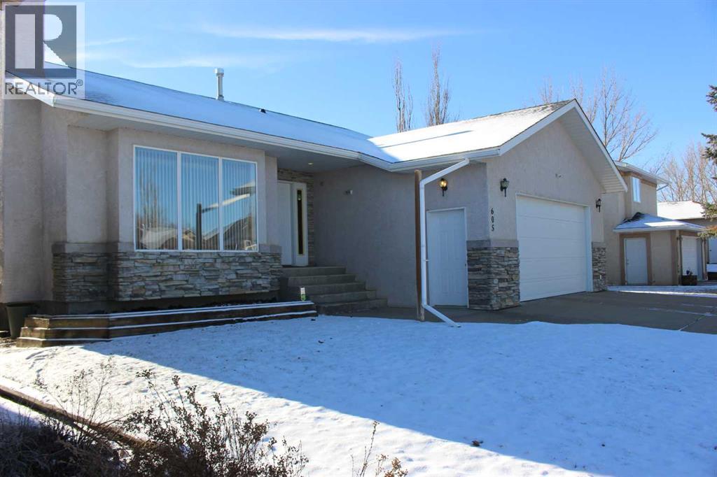 <div class="slider-price">$495,000.00</div><p>605 Maple Place, Picture Butte, Alberta</p>