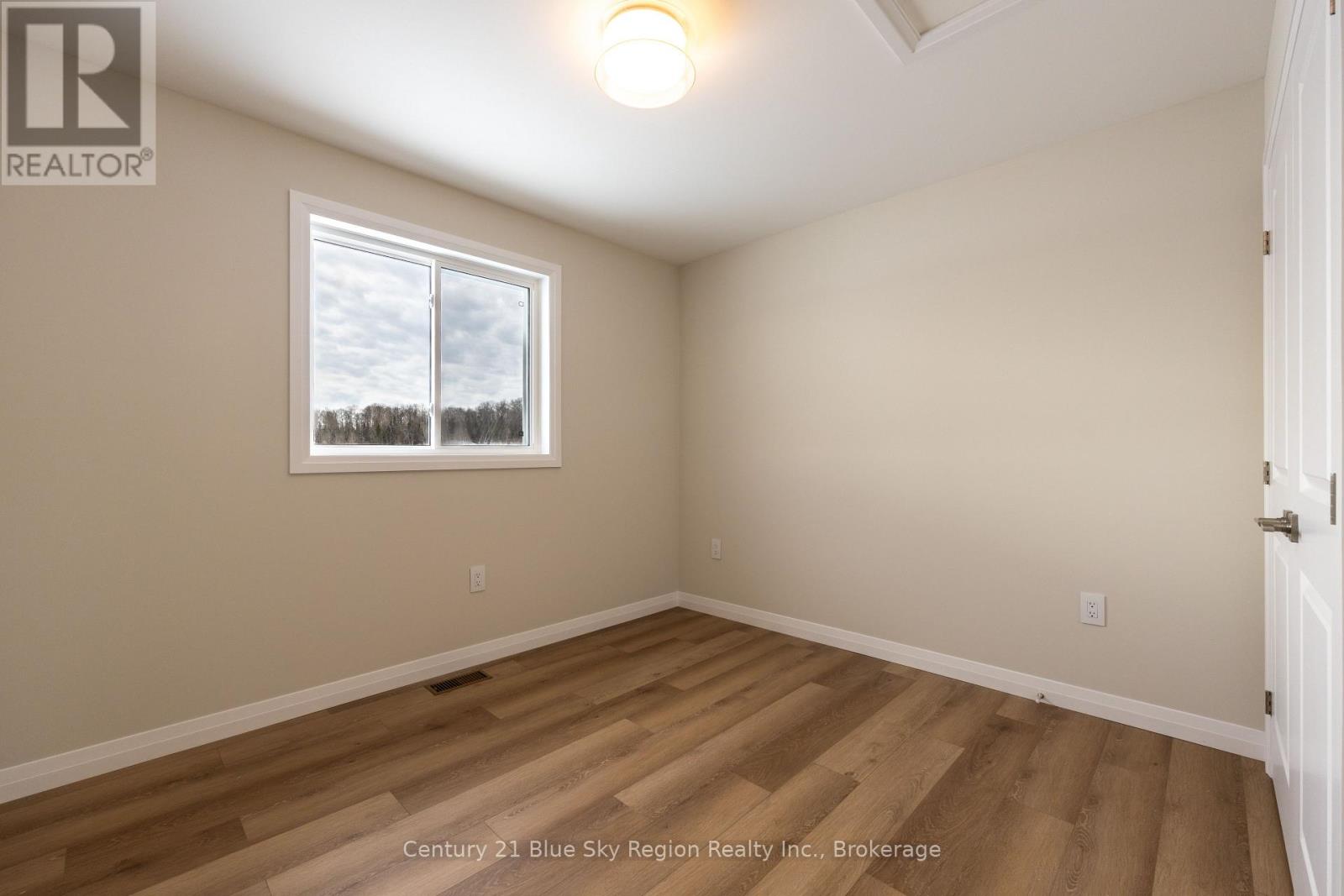 201 Talon Crescent, Bonfield, Ontario  P0H 2E0 - Photo 13 - X12538260