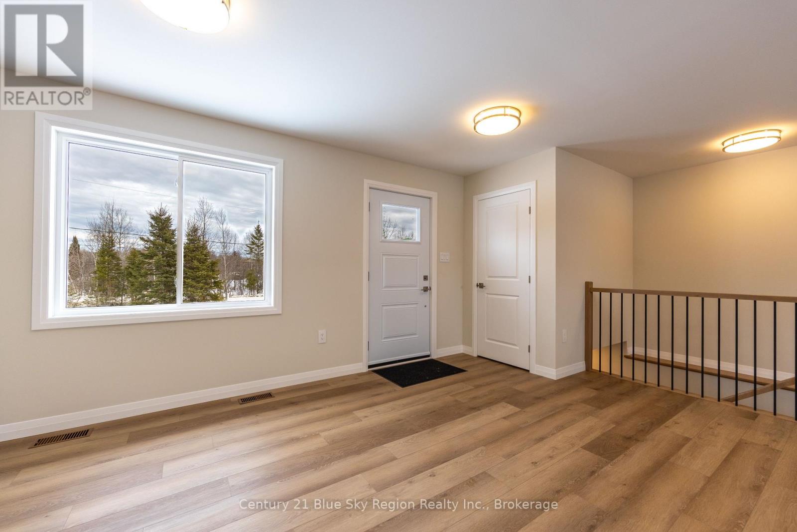 201 Talon Crescent, Bonfield, Ontario  P0H 2E0 - Photo 4 - X12538260