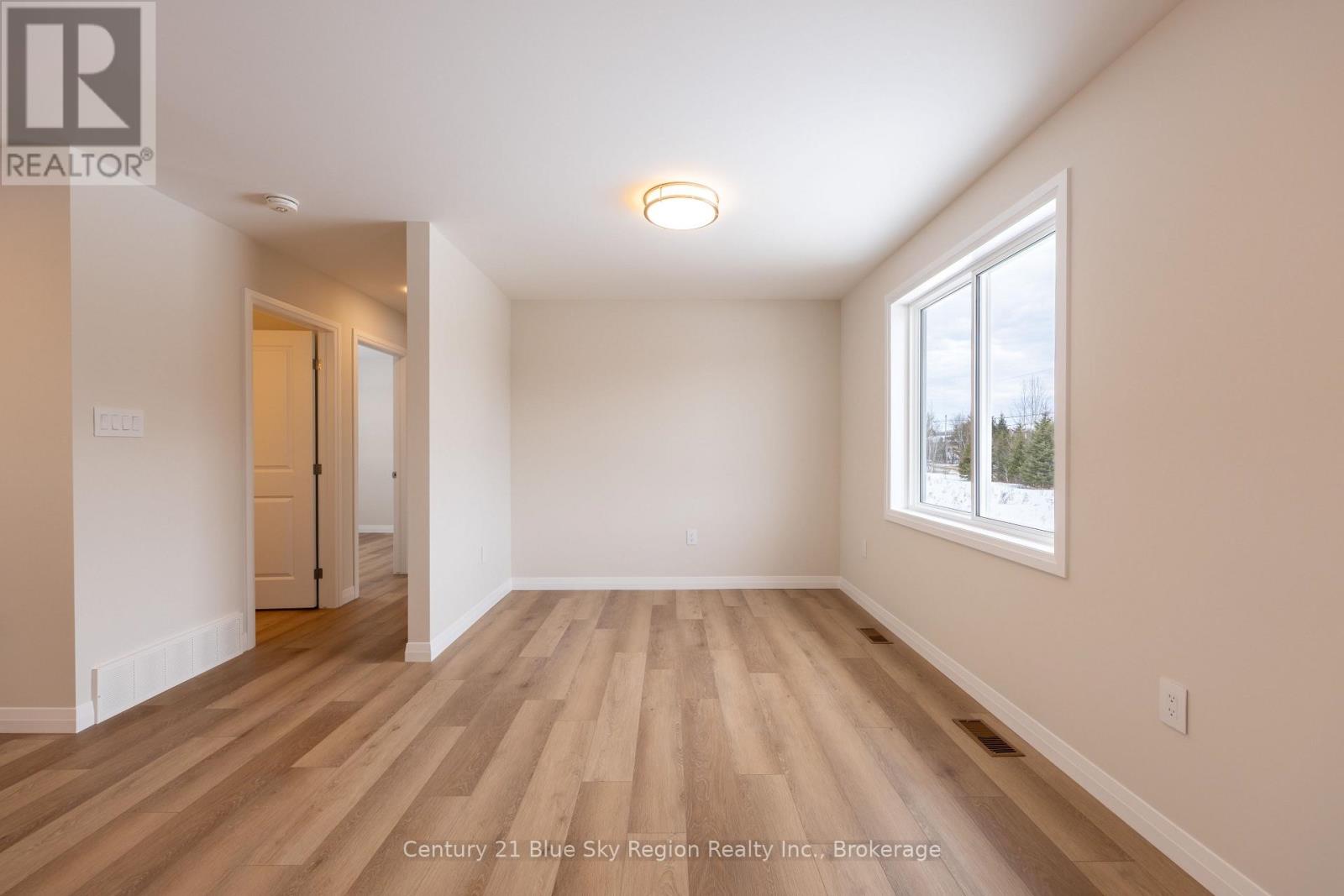 201 Talon Crescent, Bonfield, Ontario  P0H 2E0 - Photo 8 - X12538260