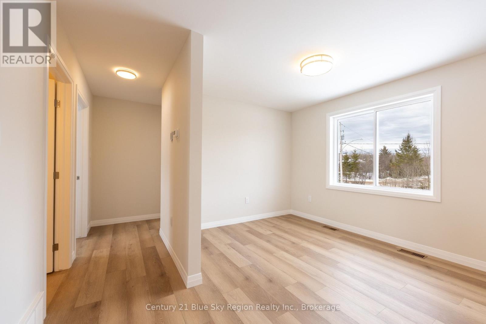 201 Talon Crescent, Bonfield, Ontario  P0H 2E0 - Photo 9 - X12538260