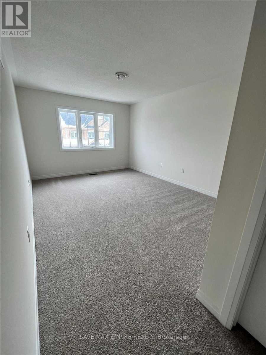 5 Brixham Lane, Brampton (Fletcher's Meadow), Ontario  L7A 5K2 - Photo 13 - W12840854