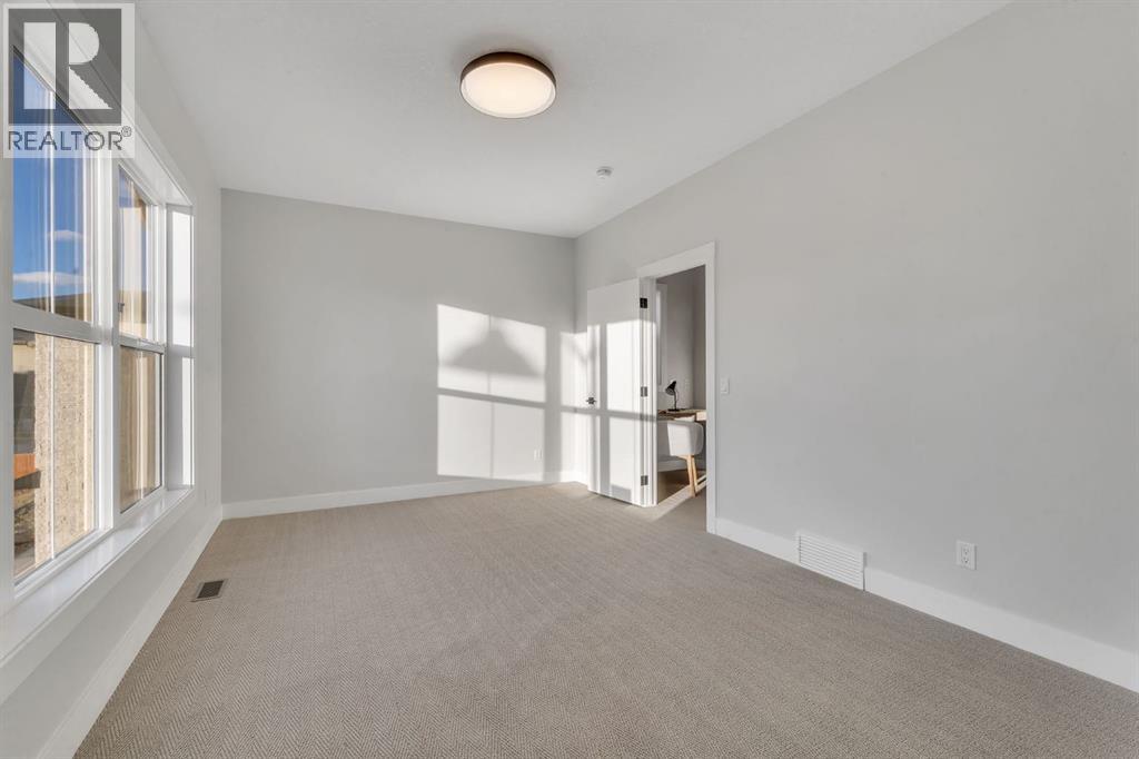 28 Spring Creek Point Sw, Calgary, Alberta  T3H 6E2 - Photo 36 - A2287176